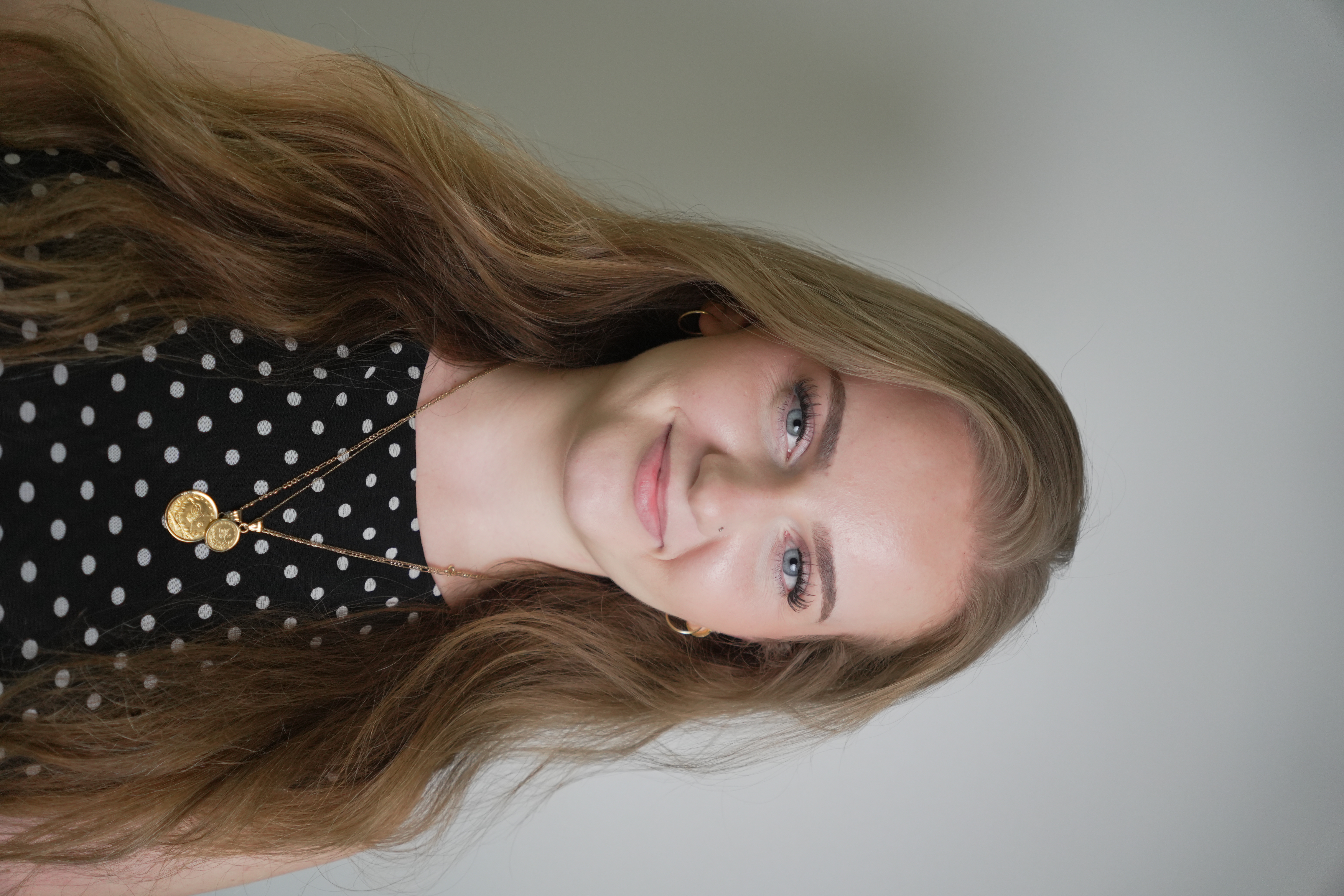 Bleona, hairstylist at Artistly Salon and Spa in Winnipeg