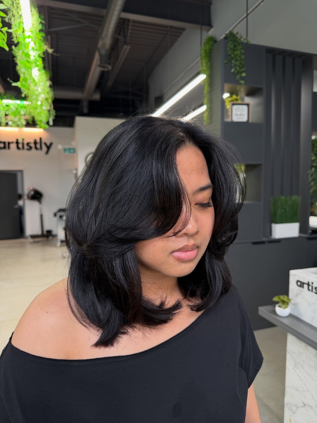 A precision blowout bob shaped in the Artistly studio