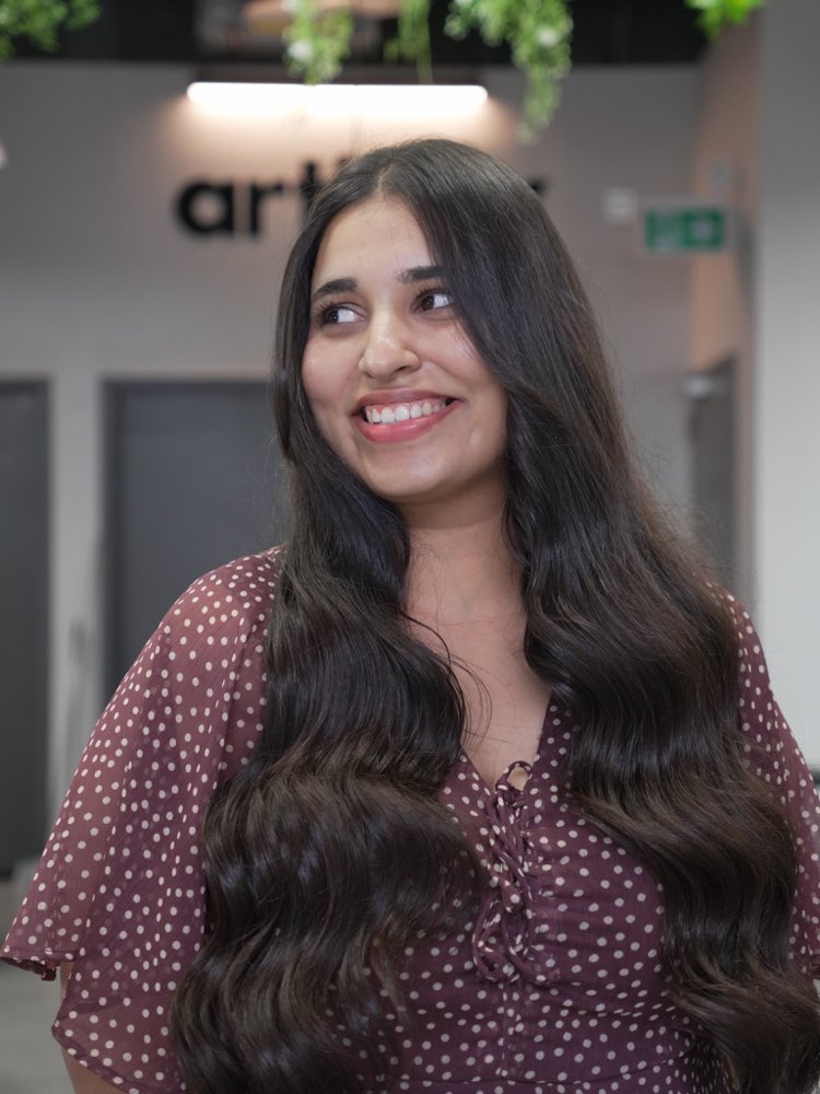 A soft brunette wave styled at Artistly